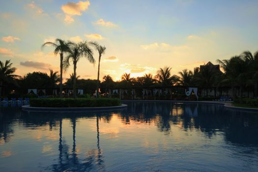 Resort pool taken at sunrise before crowd shows up