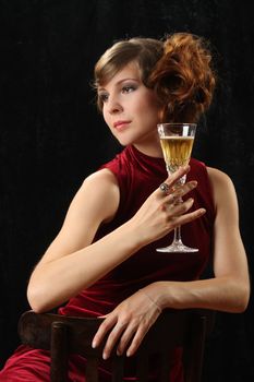 The beautiful girl with a wine glass