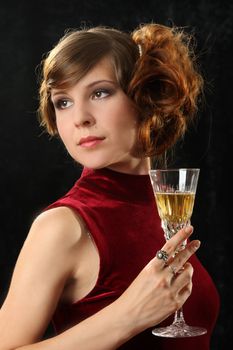 The beautiful girl with a wine glass