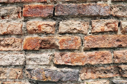 Aged brick wall background.