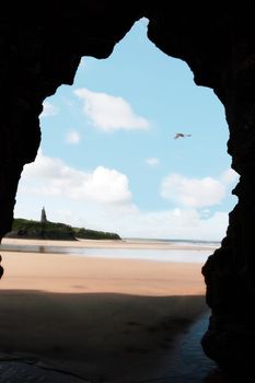 view from a cave in a cliff face in ballybunion ireland