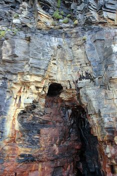 a cave in a cliff face in ireland