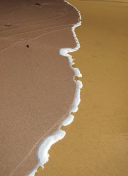 tide turning on the beach in ballybunion ireland