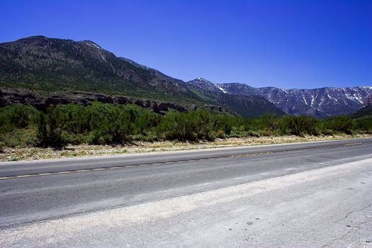 Empry freeway among the mountains in america