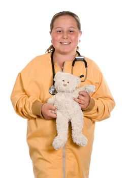 A young girl pretending to be a nurse and holding a stuffed bear, isolated against a white background