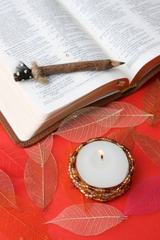 Leather bound bible opened at a piece of scripture