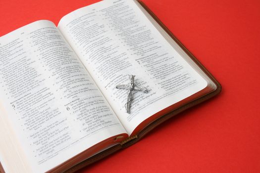 Leather bound bible opened at a piece of scripture