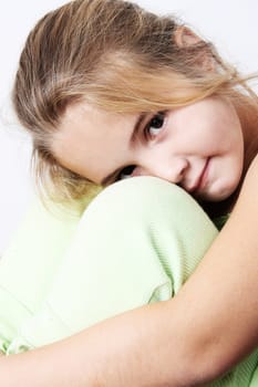 Portrait of young girl wearing green