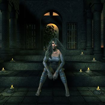 Woman sitting on steps with candles surrounding her.