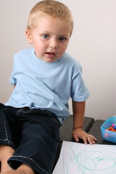Beuatiful Blond toddler with big blue eyes