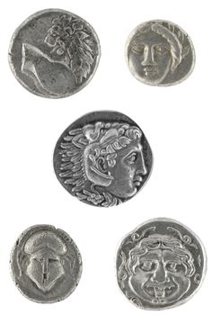 Ancient Greek coins isolated in white