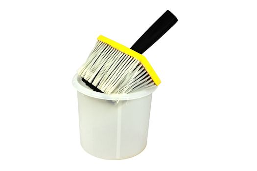 brush in white bucket isolated on white background 