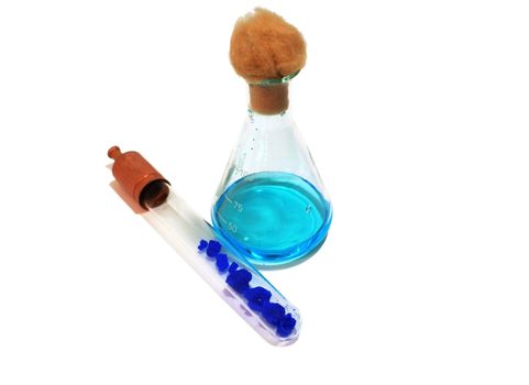 flask with copper solution and tube with copper cristals isolated