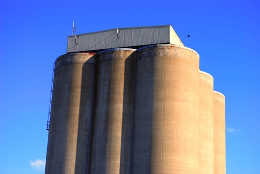 A couple of industrial silos.