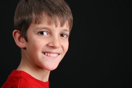 Young boy with big eyes in casual attire