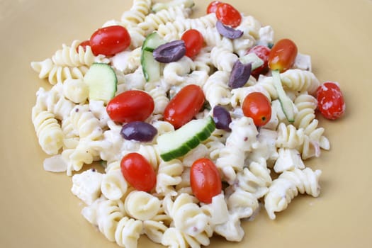 Cold Pasta Salad with tomatoes, cucumbers and olives