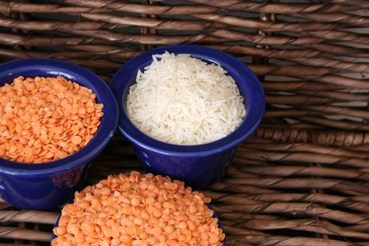Lentils and rice in blue ceramic bowls