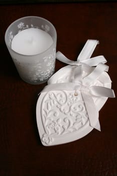 White Ceramic hearts with candle in glass