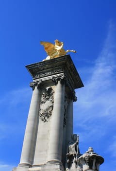 Gilded columns.Part of Pont Alexandre II bridge in Paris France.