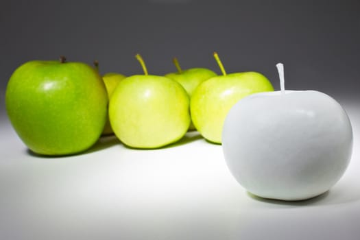 Green and white apples isolated on white