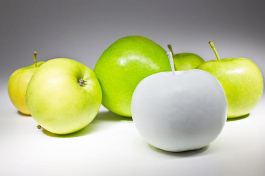 Green and white apples isolated on white