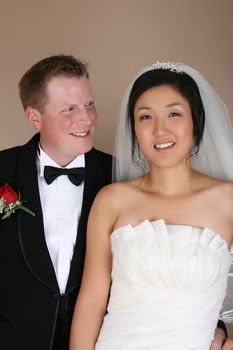 Beautiful couple on their wedding day in traditional attire