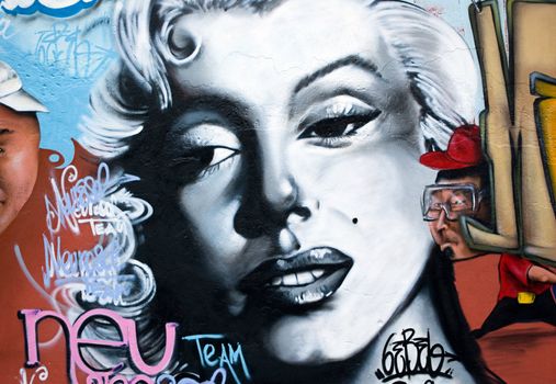 urban graffiti wall with the classic pop icon of marilyn monroe