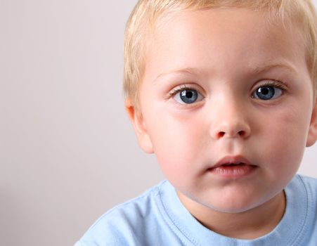 Beuatiful Blond toddler with big blue eyes