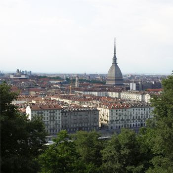 Turin skyline panorama seen from the hill with Mole Antonelliana (famous ugly wedding cake building)