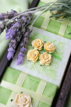 Soap Crate gift set wrapped in green, decorated with roses