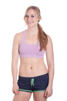 A photograph of a girl in her sports bra and work out clothes.