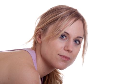 A photograph of an athletic build woman doing pushups.