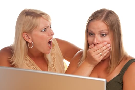 Two Shocked Women Using Laptop Isolated on a White Background.