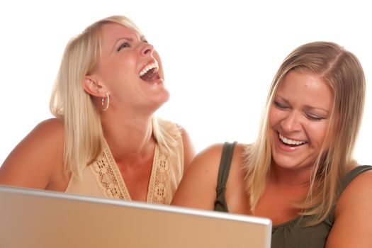 Two Laughing Women Using Laptop Isolated on a White Background.