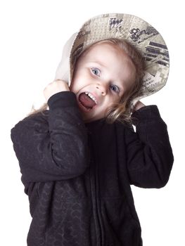 Photograph of an adorable girl isolated on white.  She is overexcited!!!