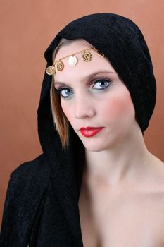 Female model with blue eyes wearing traditional folk dress