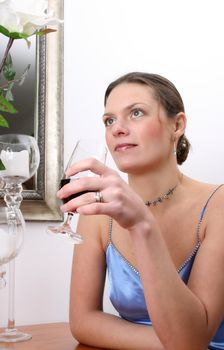 Beautiful young woman in a formal dress