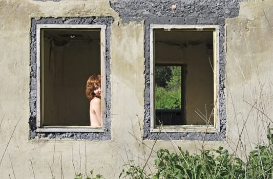 old ruined house and girl