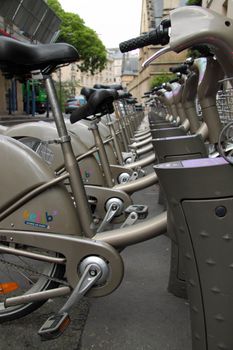 Bicycles stand ready for use at the start of the day - the scene at one of the many bike stations which form a part of Paris' "velib" cycle rental scheme which extends across the city
