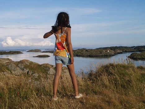girl in coastal landscape