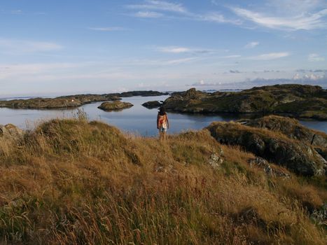 coastal landscape with girl in foreground