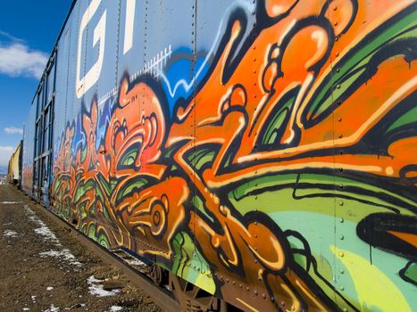 Vibrant vandalism on a train box car