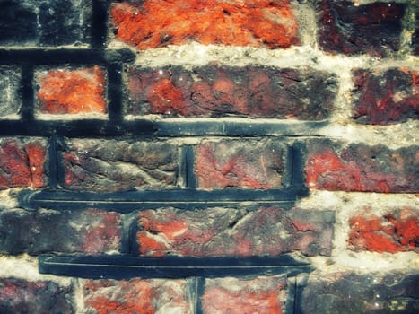 background image of a worn brick wall