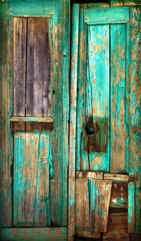 Old wooden door. Old painted wooden boards. Old paint. Background.