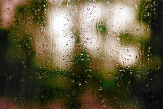 Background. Droplets and jets of water in bright light.