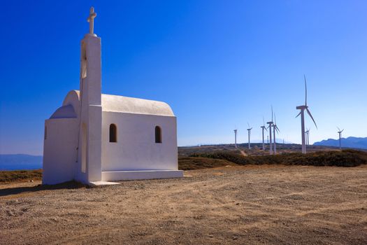 Mountain landscape. Chapel.Windmill. Crete. Greece.