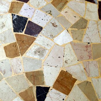 A floor with irregular tiles (opus incertum)
