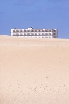 Modern hotel in the midle of the sandy desert.