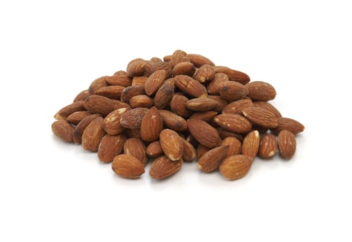 A pile of almonds isolated on white background.