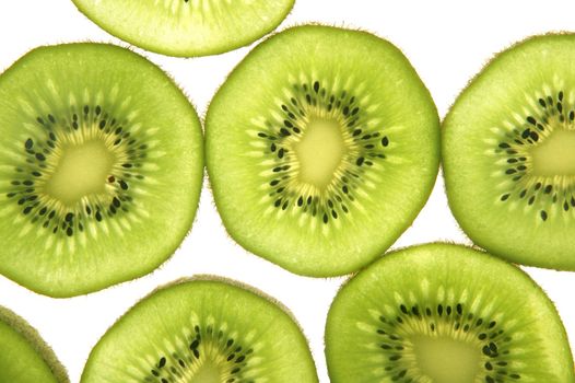 Kiwi green transparent slices over white background